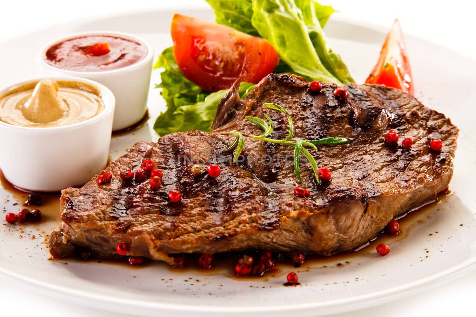 Grilled steaks and vegetables