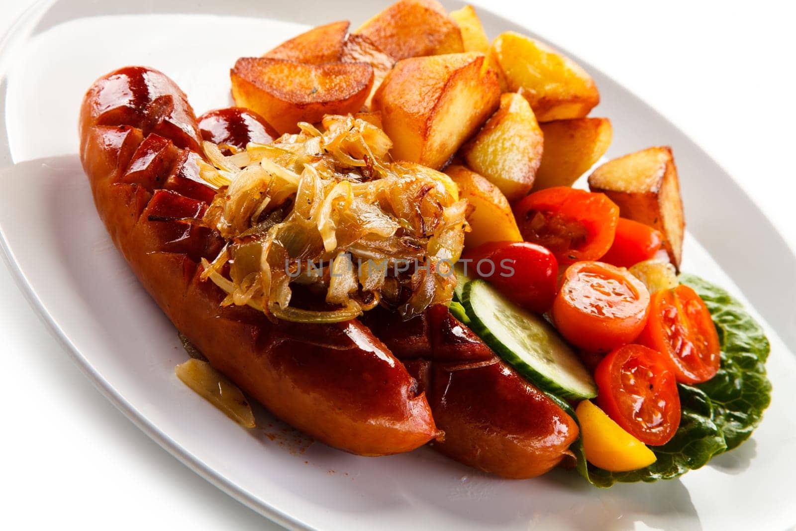 Grilled sausages and vegetables