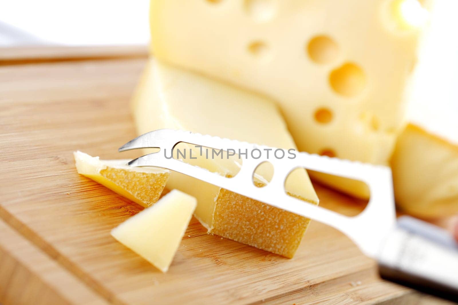 cheese with a cheese knife