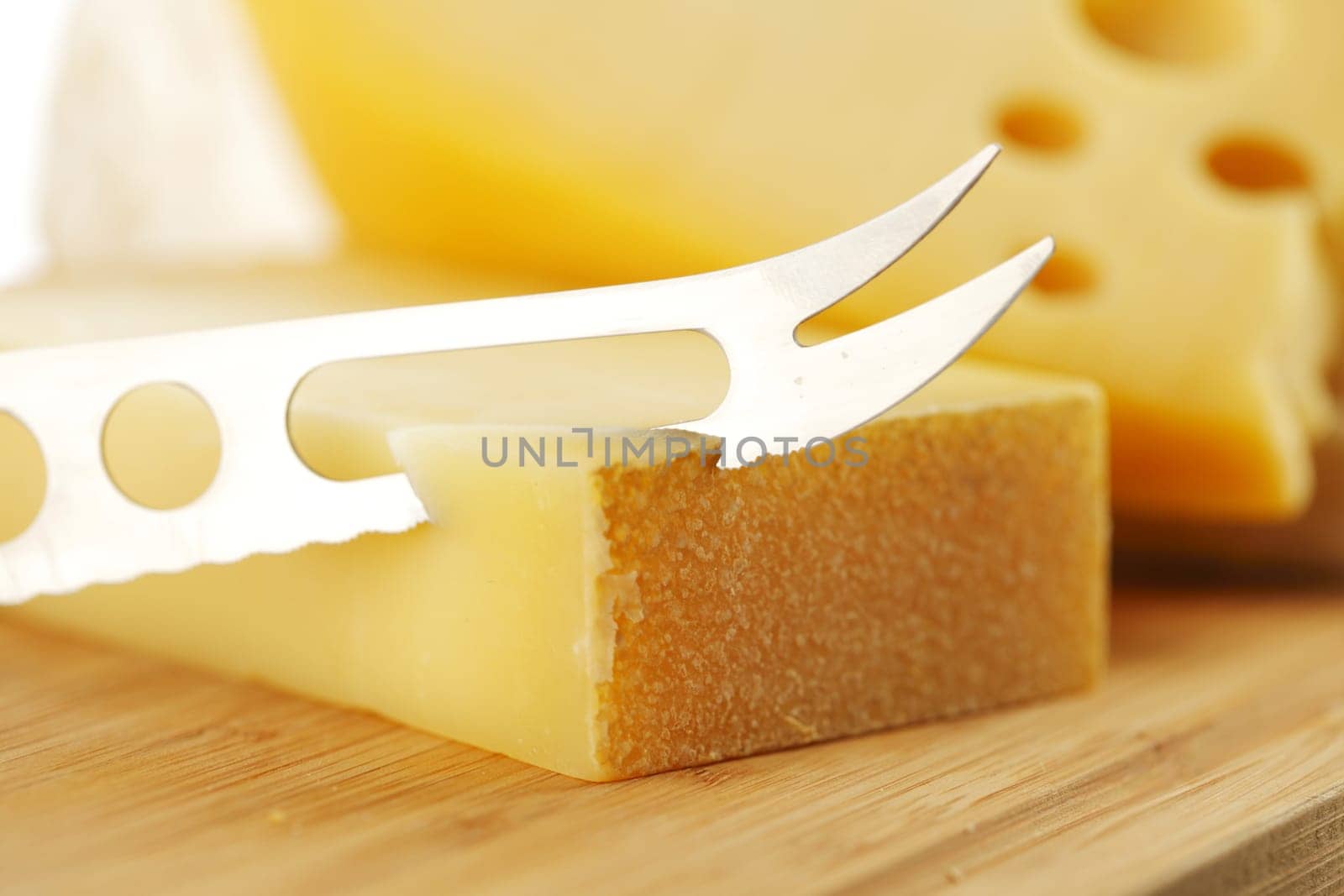 cheese with a cheese knife
