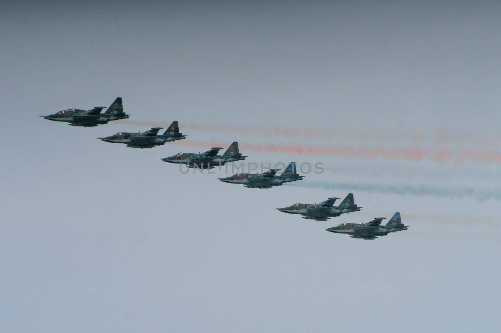 St. Petersburg, Russia, July 25, 2021 military parade, group of 6 military aircraft of Su-25 Frogfoot, attack aircraft in the sky side view