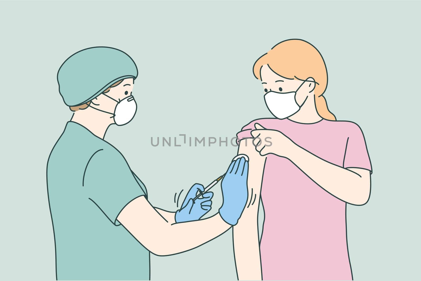 Woman doctor in protective medical mask and uniform holding syringe before making injection to young female patient in medical clinic. Vaccination, Covid-19 coronavirus vaccine concept
