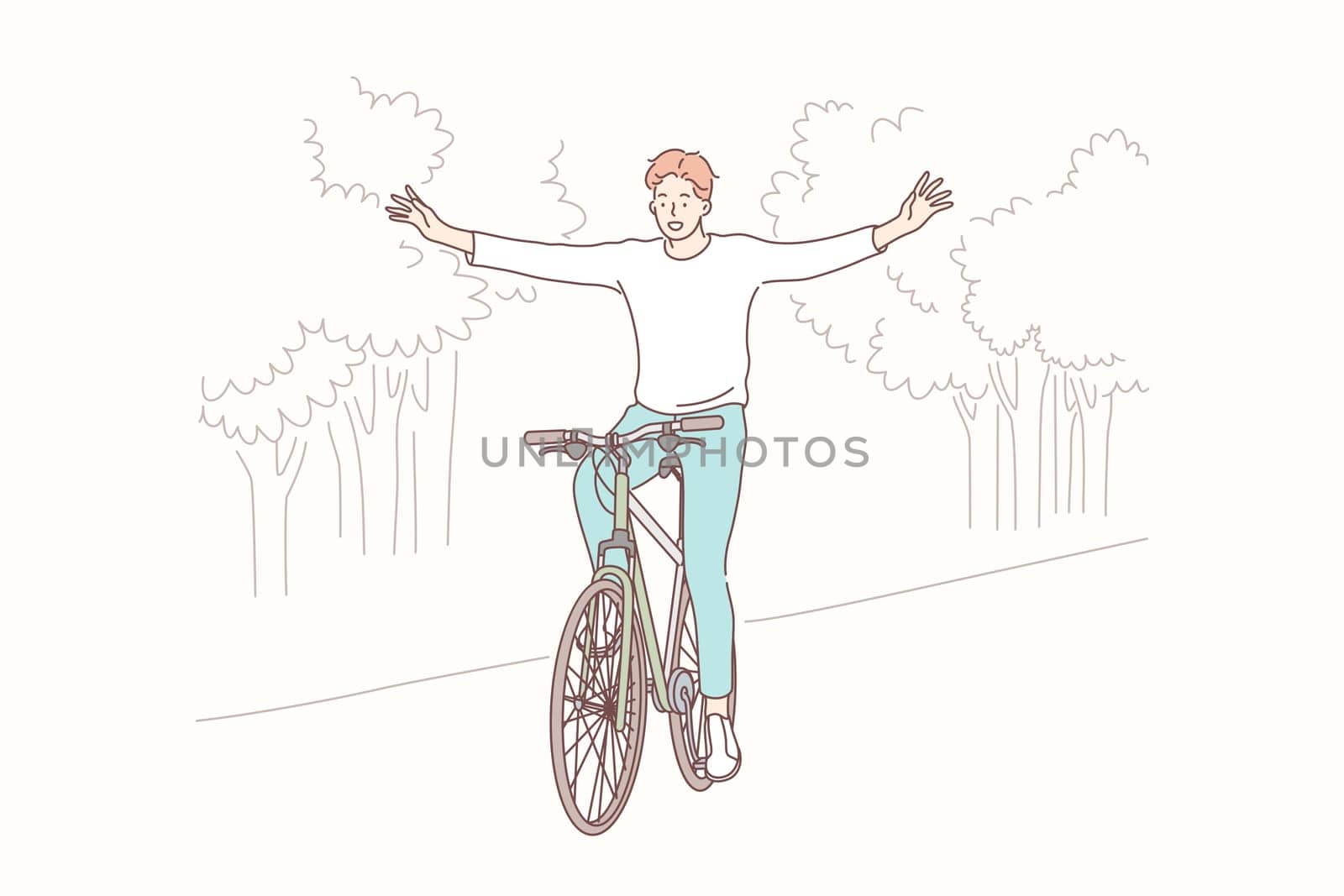 Cycling in park, freedom, lifestyle concept. Young happy smiling boy teenager student or man cyclist indulges in bicycling without hands in park. Outdoor sport activity healthy lifestyle leisure time.