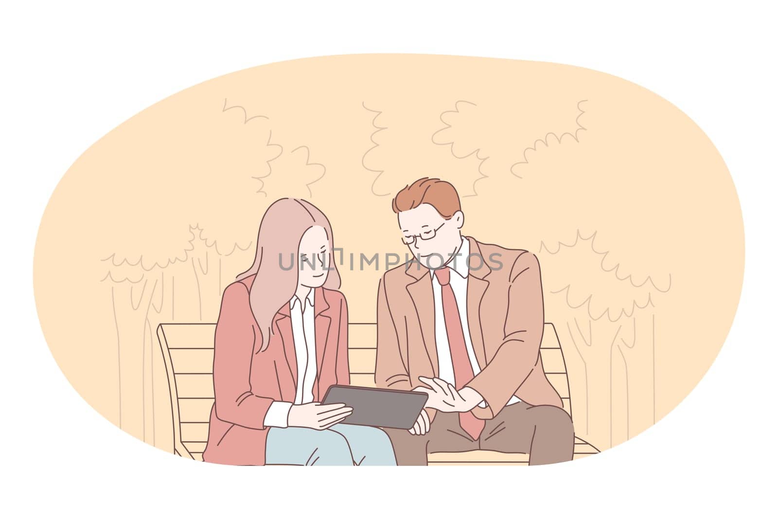 Teamwork, brainstorming, business communication about startup concept. Young business people coworkers or partners sitting on bench in park with tablet and communicating about corporate project