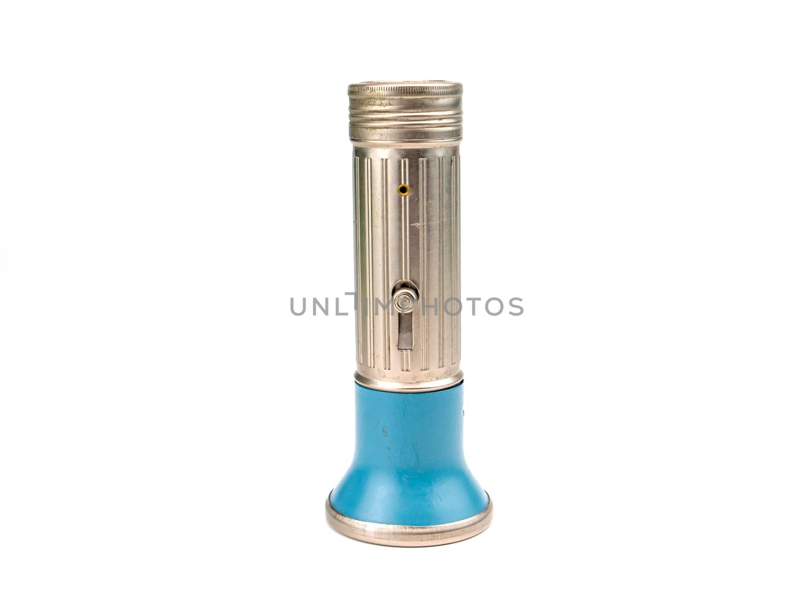 Pocket flashlight in a metal case on a white background. Retro. Technology. Place for text. Background image.