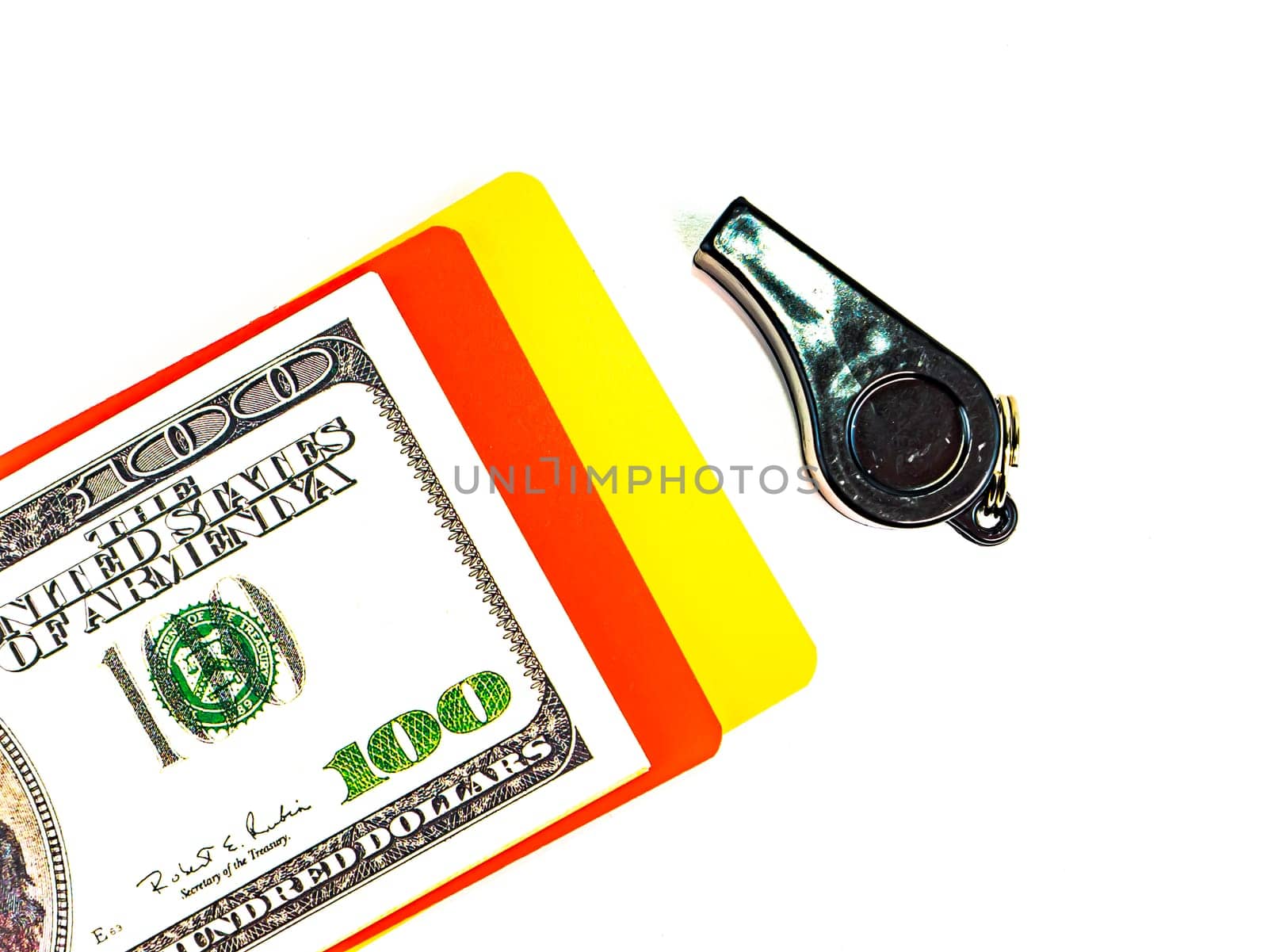 Warning cards and money of a football referee.. Corruption of a football referee for money. Money. Soccer referee cards. Sport. Tote. Bribe. Rates. Bribe. Place for text. Euro currency. Dollar.