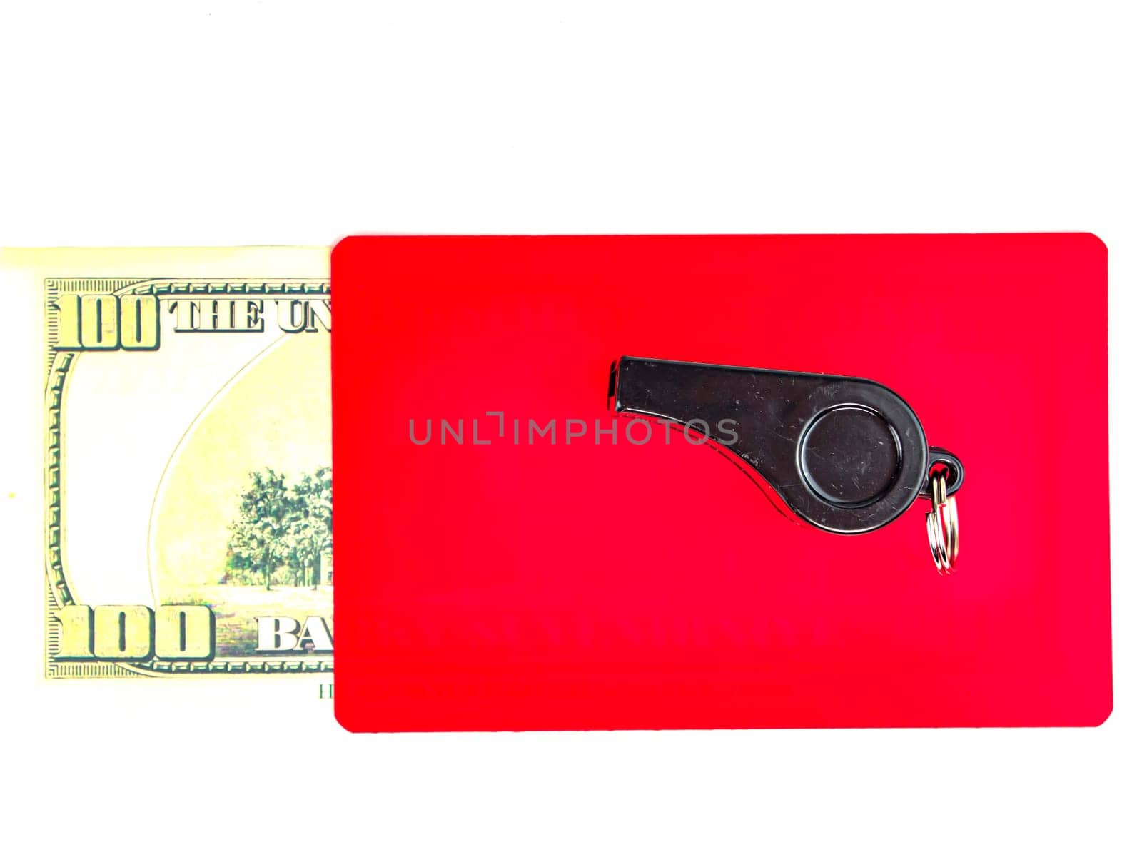 Warning cards and money of a football referee.. Corruption of a football referee for money. Money. Soccer referee cards. Sport. Tote. Bribe. Rates. Bribe. Place for text. Euro currency. Dollar.