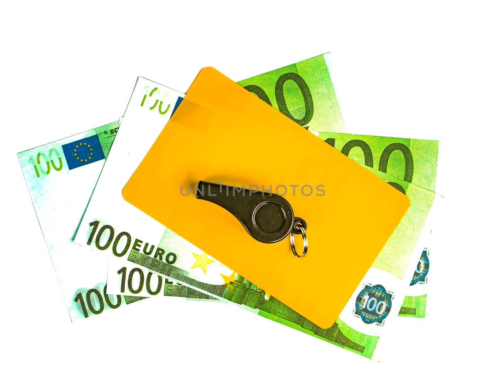 Warning cards and money of a football referee.. Corruption of a football referee for money. Money. Soccer referee cards. Sport. Tote. Bribe. Rates. Bribe. Place for text. Euro currency. Dollar.