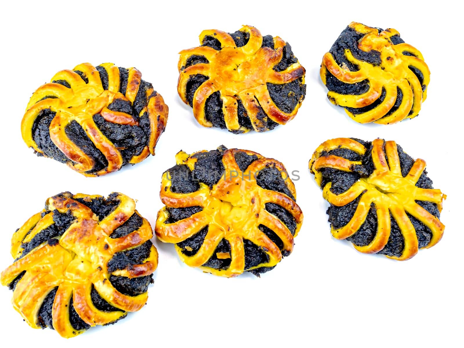 Baking with poppy seeds on a white background. Food photo. Dessert. Kitchen. Place for text.