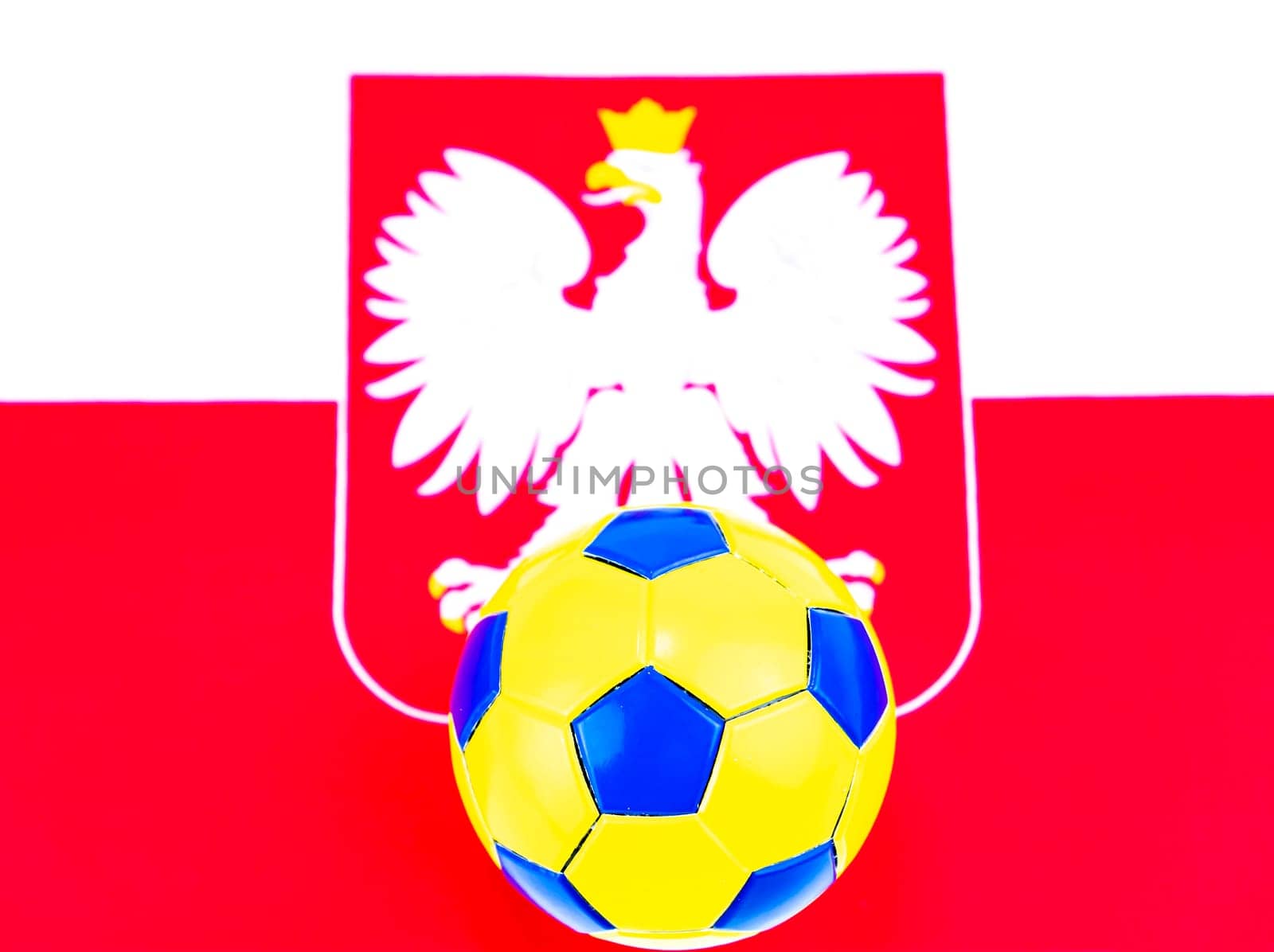Soccer ball on the background of the flag of Poland. Championship. World. Europe. Place for text.