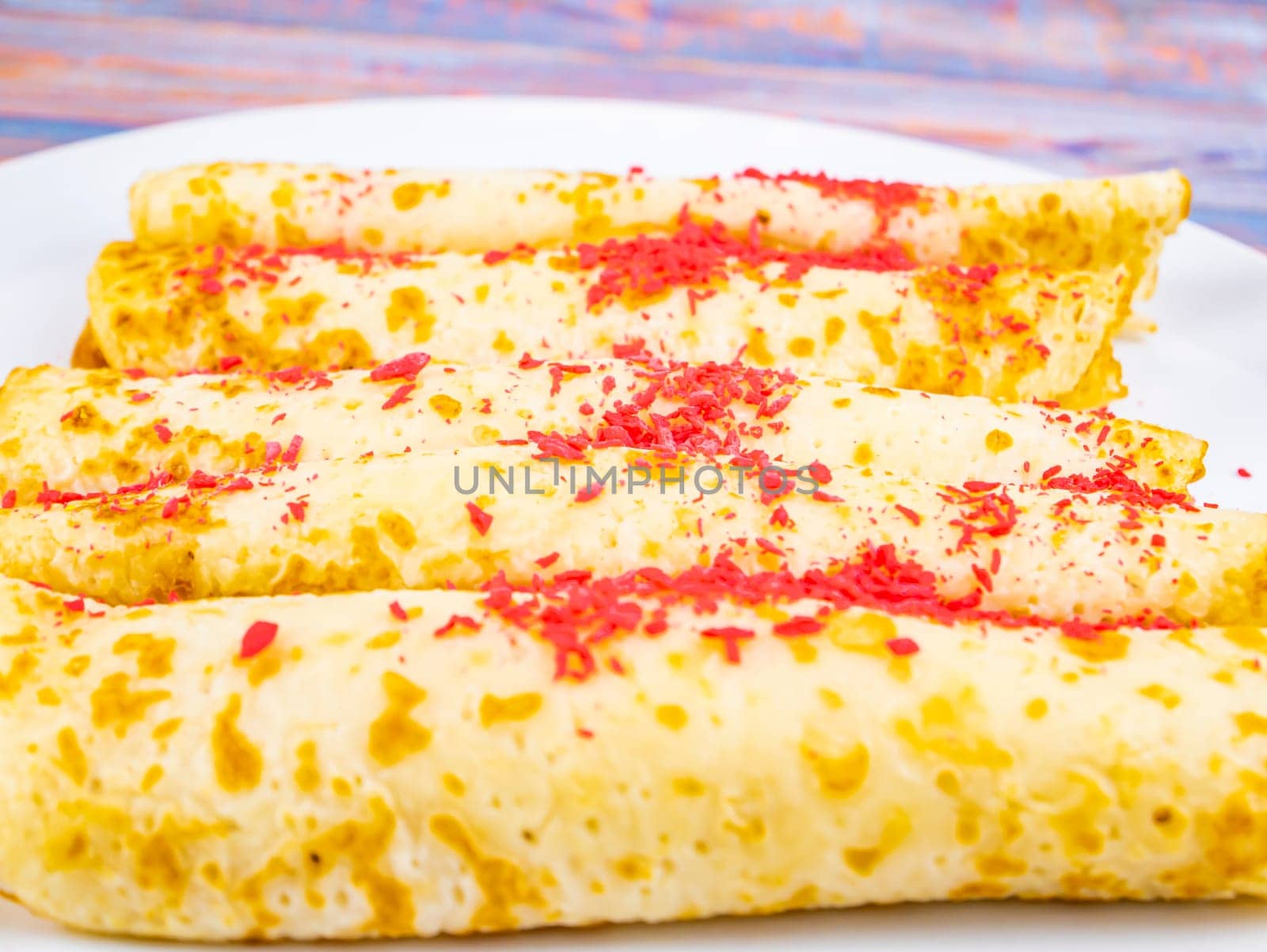 Pancakes on a plate on a pancake day. Fat Tuesday. Mardi Gras. Fastnacht. Vastlavya. Maslenitsa. Leftovers. Food photo.