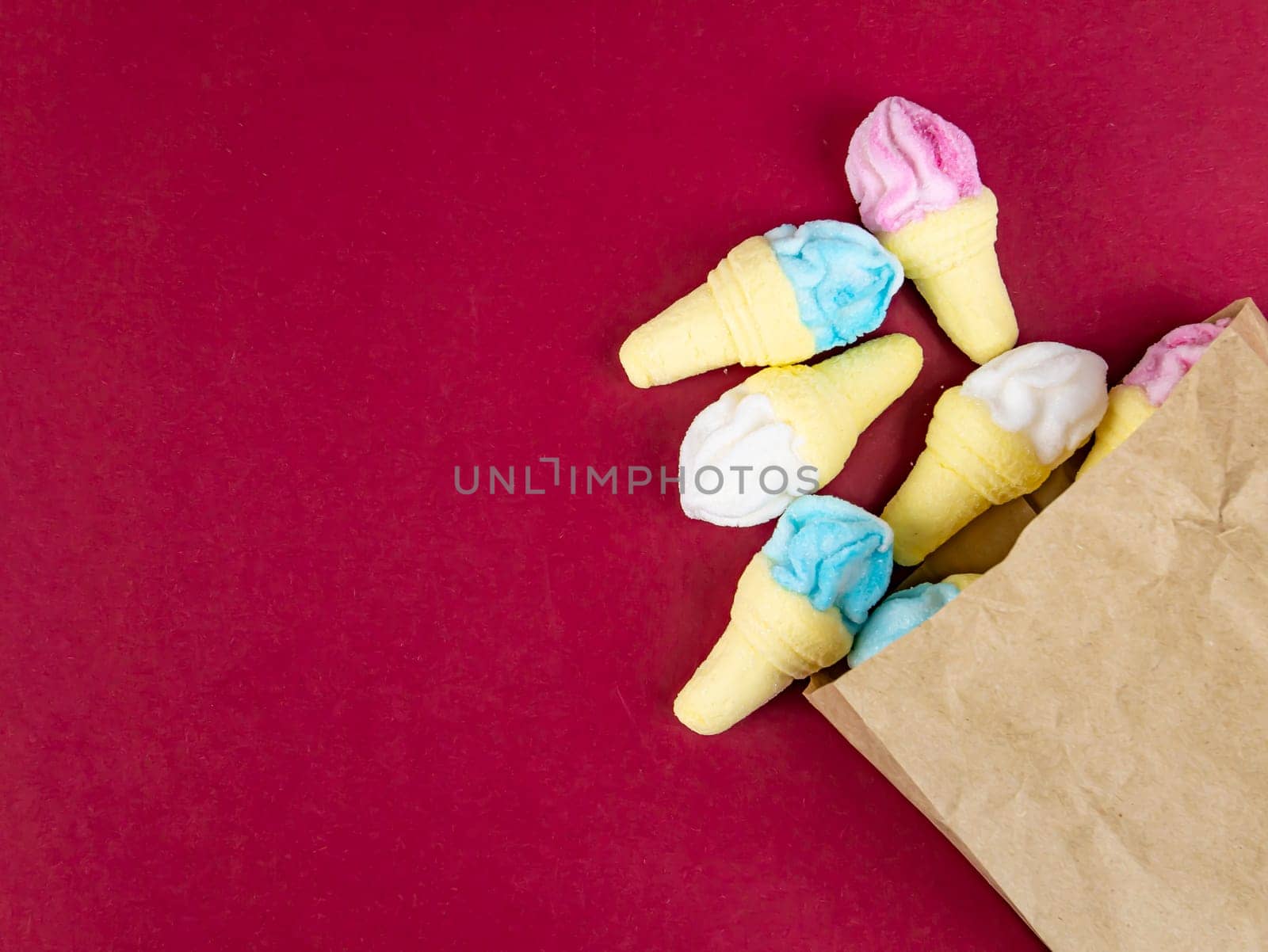 Ice cream in a cup on a red background. Food photo. Place for text.