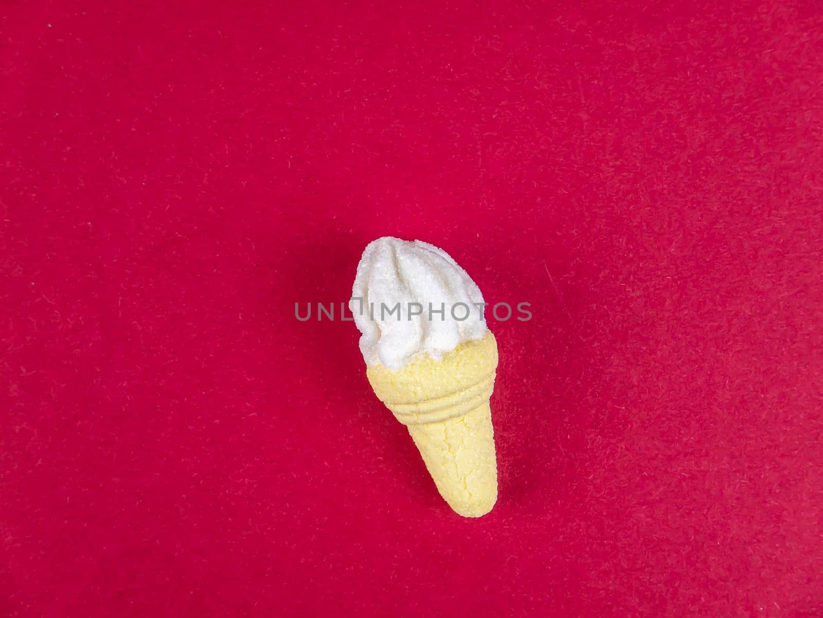 Ice cream in a cup on a red background. Food photo. Place for text.