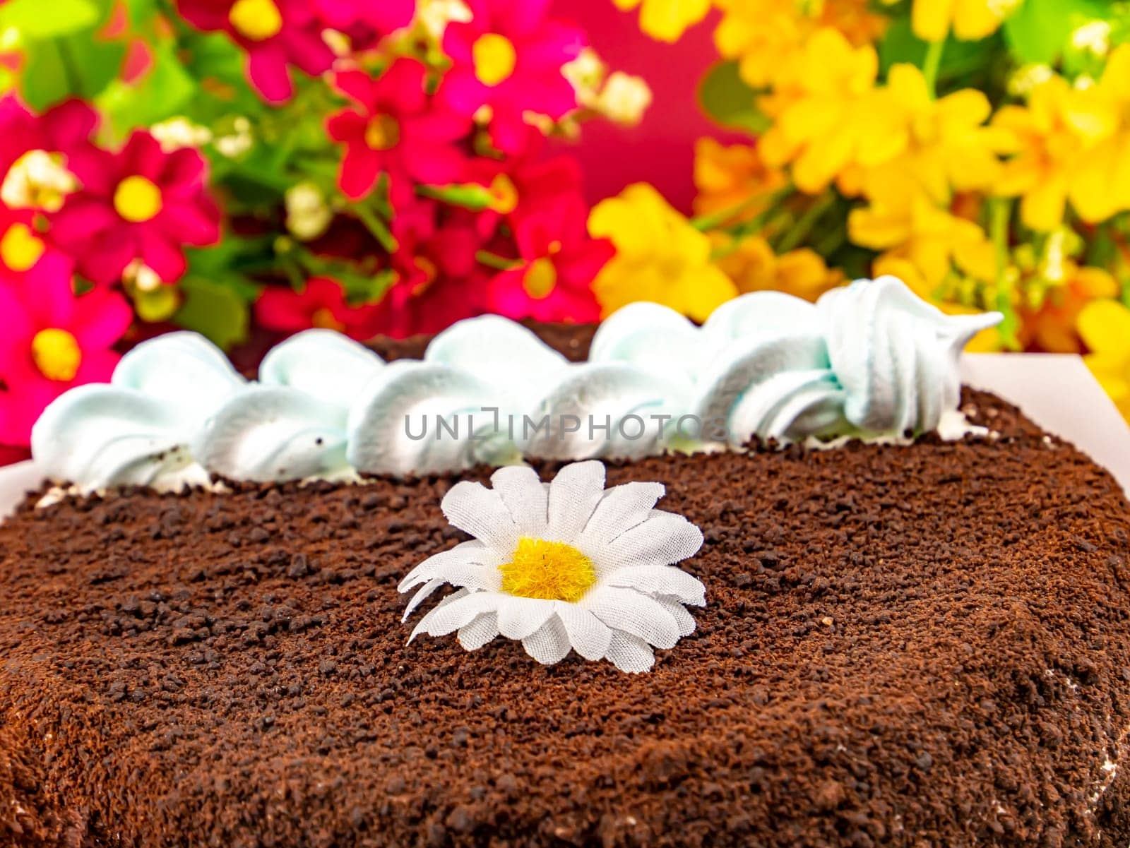 Festive chocolate cake with white biscuit cream. Food photo. Birthday cake. Shop window. Place for text. Sweets. Dessert. Cake baking. Background image.