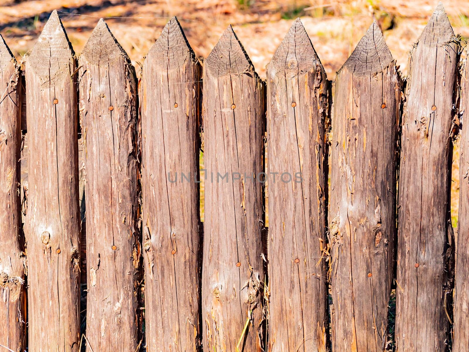 Background image of a wooden fence picket fence. Place for text. Background image.