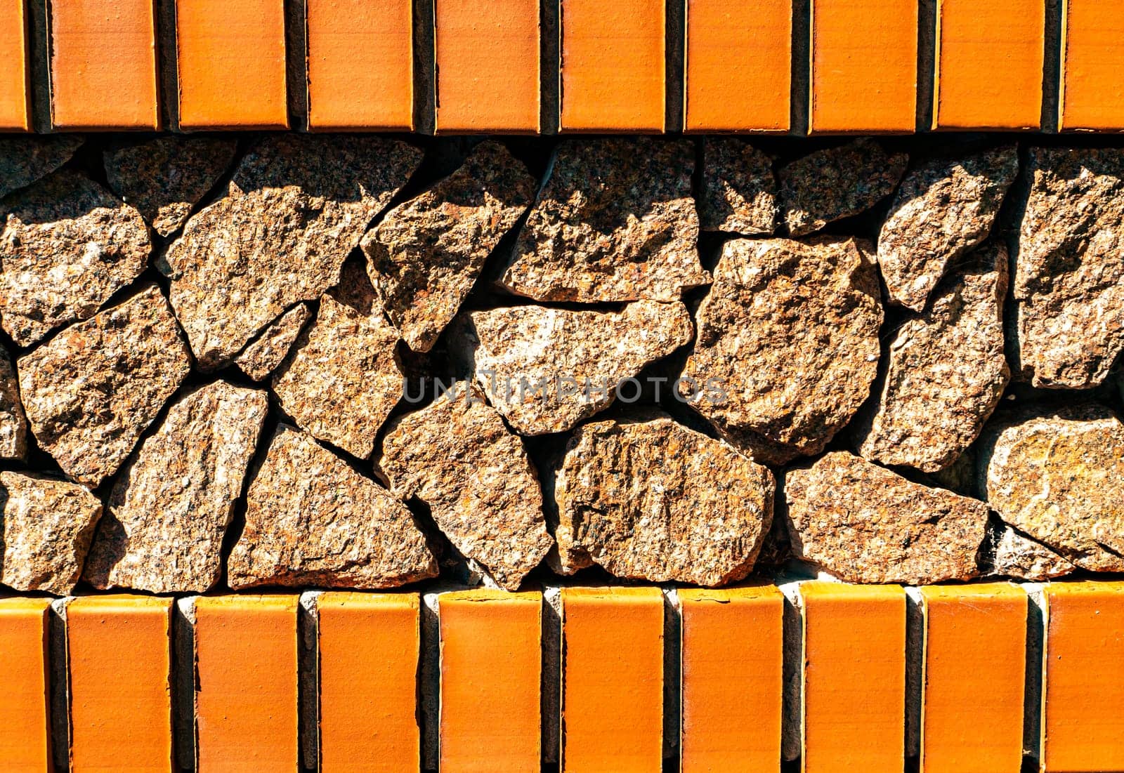 Brick granite stone wall with place for text. Texture of the wall. Background image. Place for text. Building sector. Website design.