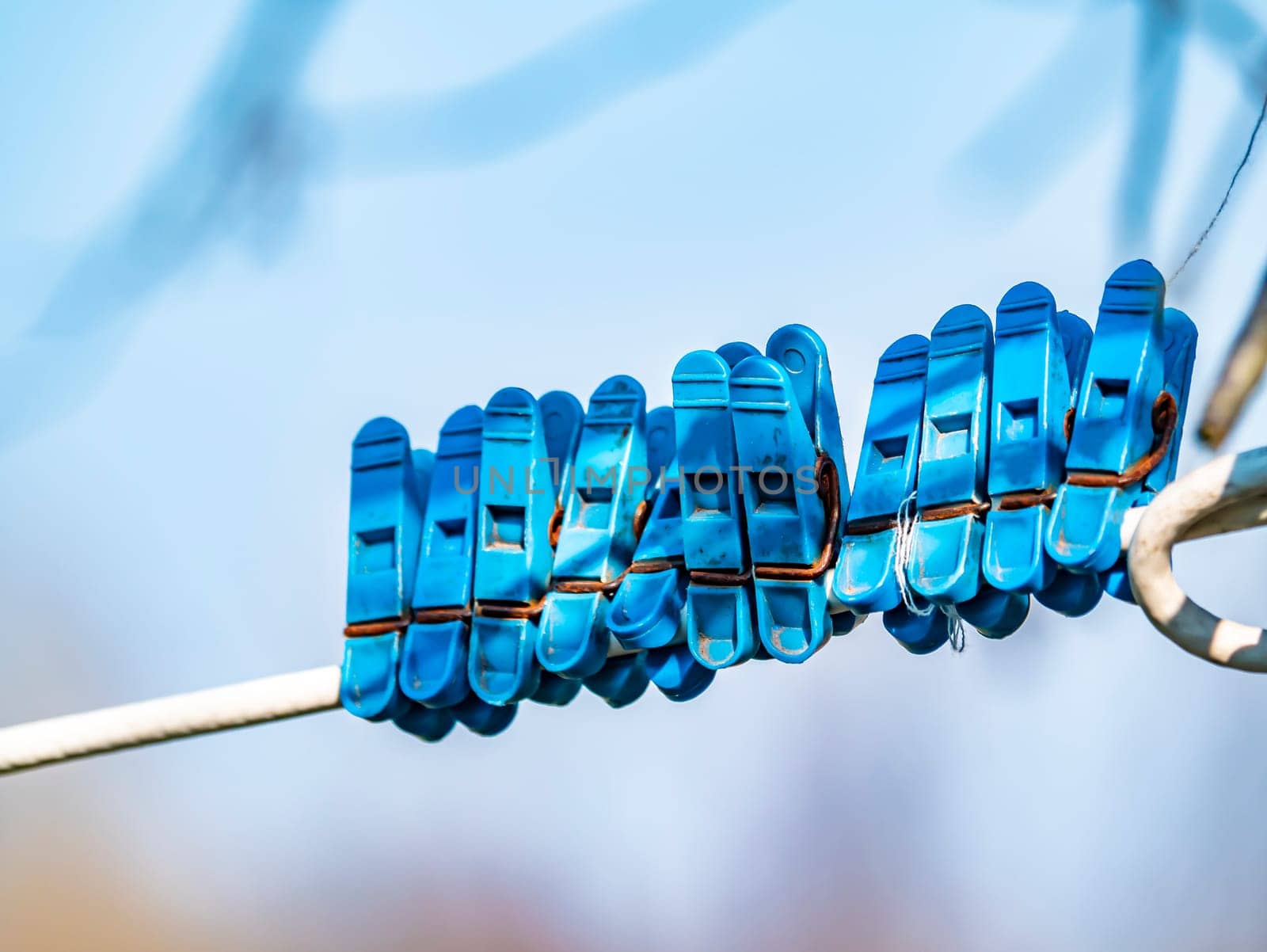 Clothespins for laundry on a clothesline. Background image. Place for text. Home life.