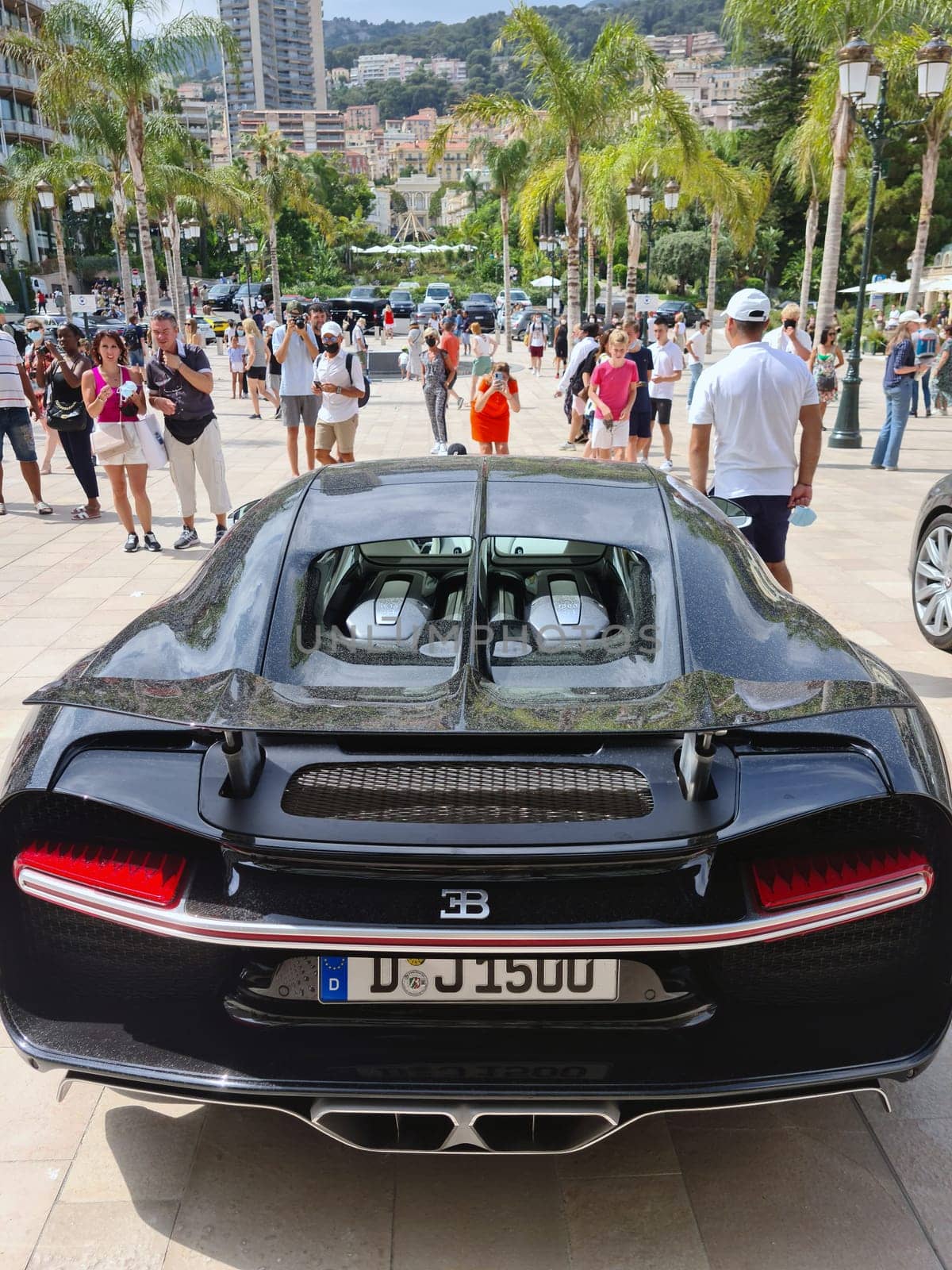 Monte-Carlo, Monaco - July 24, 2021: White Bugatti Chiron Luxury Supercar Parked In Front Of The Monte-Carlo Casino In Monaco On The French Riviera, Europe - Rear View
