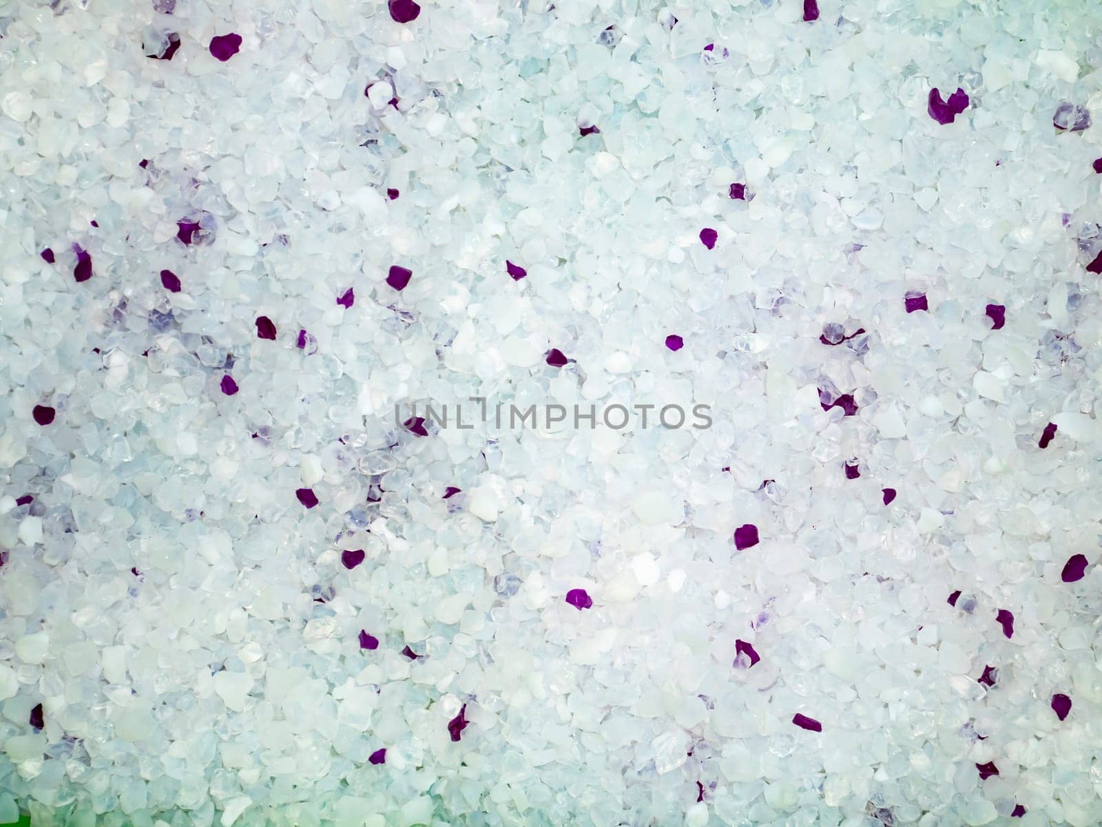 The texture of the white cat litter filler. Background image. Place for text. Natural conditions. Toilet for cats. Selicogel.