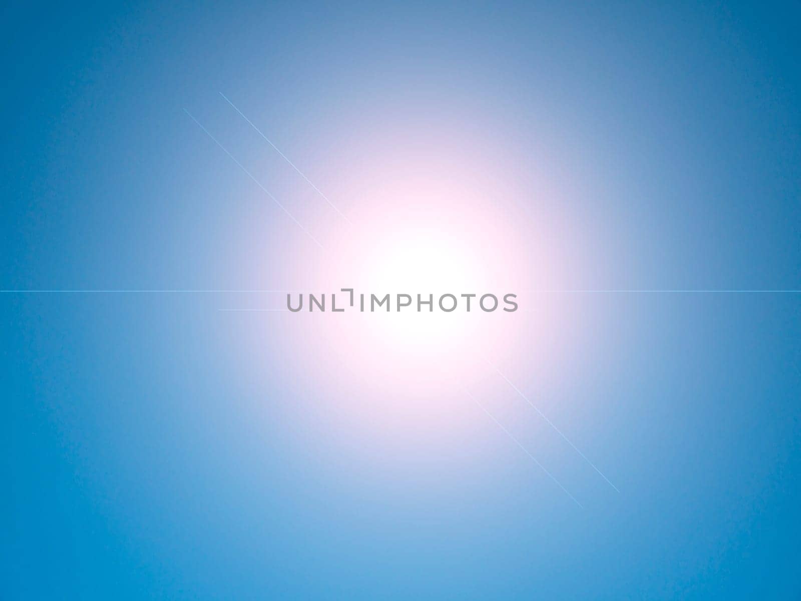 Sun rays on a background of blue sky. Natural background. Lens flare in the sun. Heavenly landscape. Space. Stratosphere. Background image. Poster. Place for text. Clear sky.