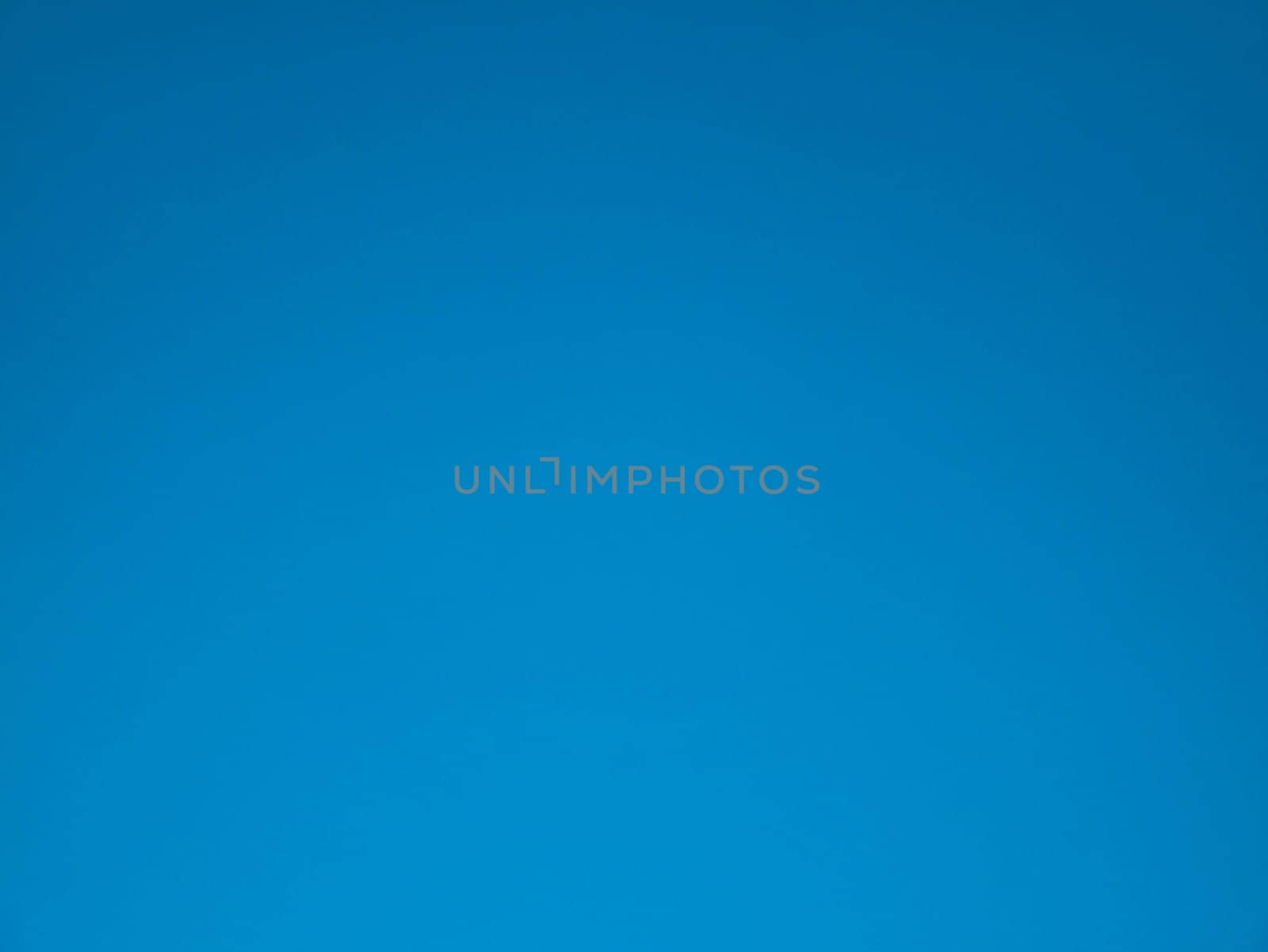 Background image of a cloudless blue sky. Outer space. Stratosphere. Background image. Place for text. Template. Poster. Look into the distance. Admire the view. Periodny landscape.