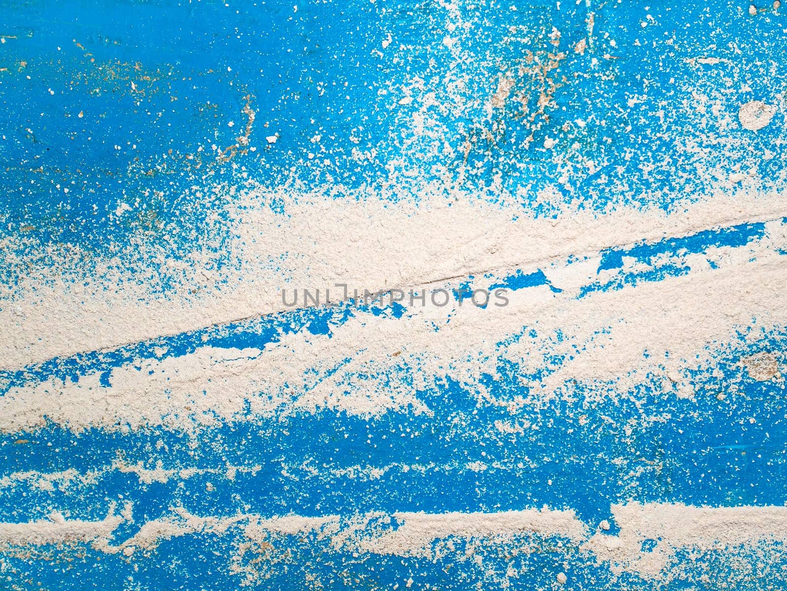 White chalk dust on a blue background. Background image. Place for text. Template. Poster. Building sector. Construction and repair. Retro style