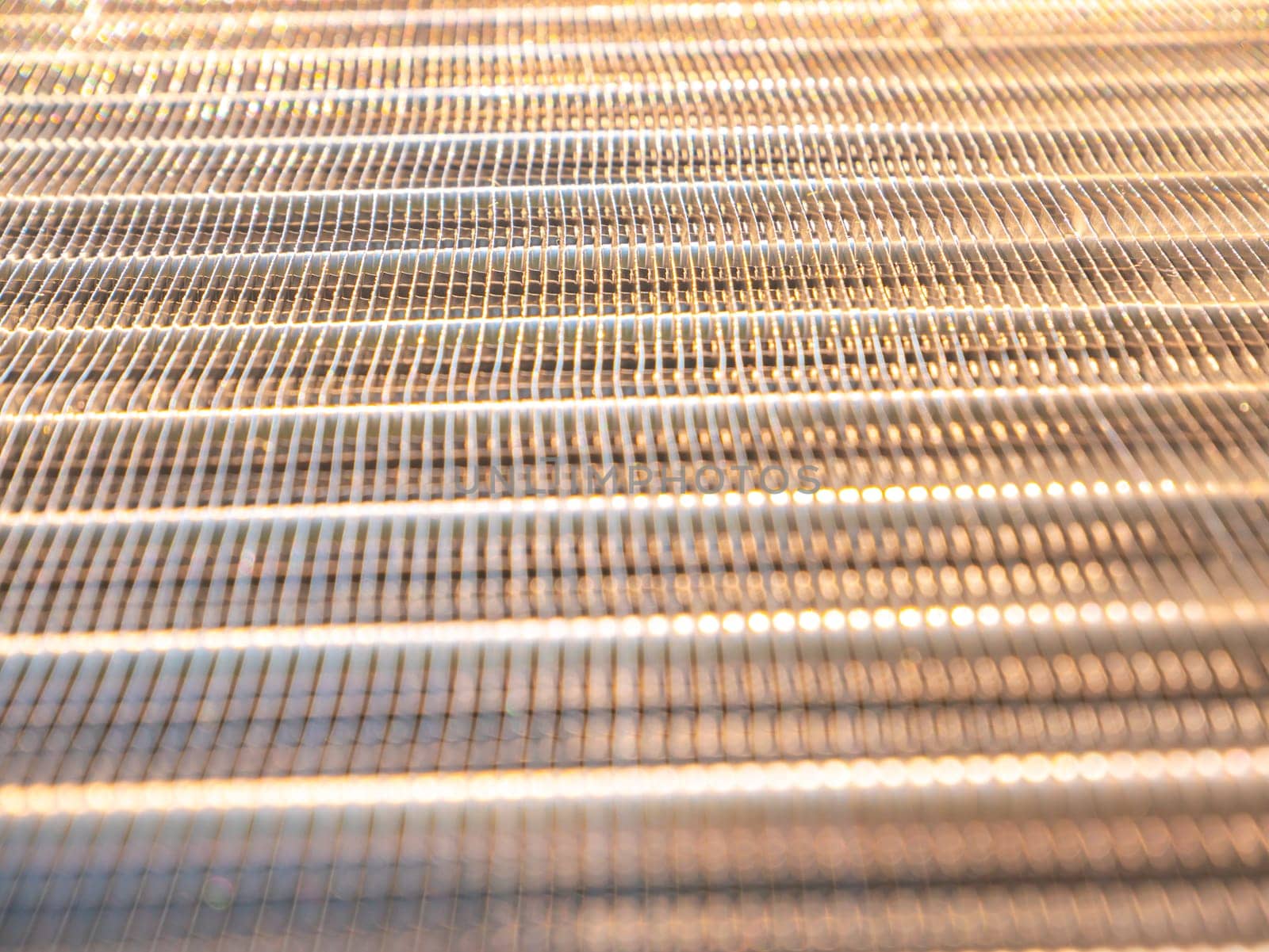 Aluminum radiator for engine cooling and car air conditioning. Refrigeration system cooling condenser. Refrigerator evaporator. Car repair workshop. Refrigerator repair. Air conditioning system.