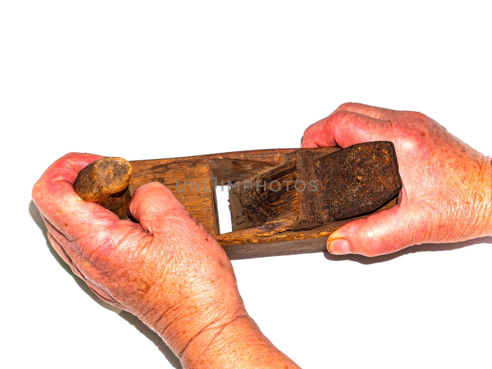 Carpentry tool wooden plane on a white background. Craftsman. Carpenter profession. Wood processing. Working tool of the plane. Background image. Place for your text. Handmade.