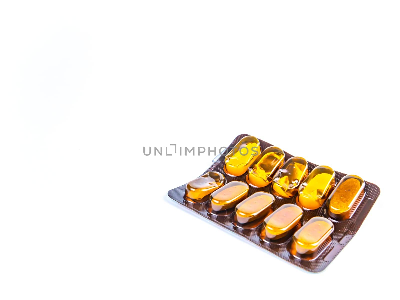 Medical medicine in pills on a white background. Pharmacy drugs in tablets. Pharmacology. Medical medicine in capsules. Pharmacy capsules for human treatment. Place for your text. Drugs in pills.