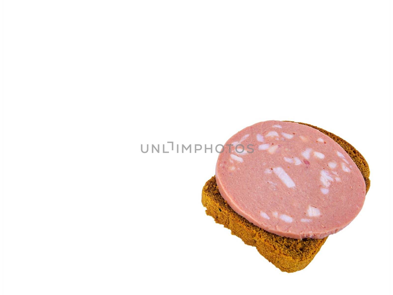 Black bread sandwich with pork sausage and lard on a white plate. Black bread. Meat sausage. Pig fat. Pork product. Fatty food. Non vegetarian food. Meat dish. Home kitchen. White background.