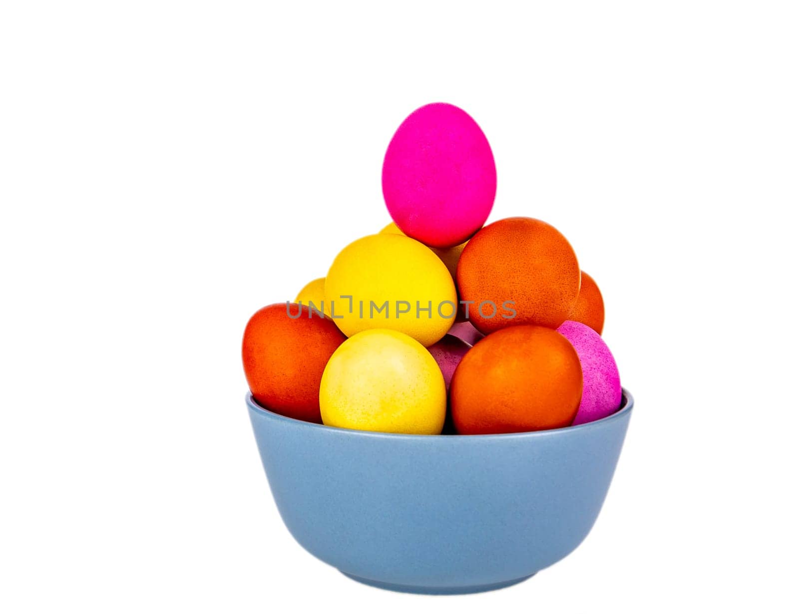 Colored Easter eggs in a plate on a white background. Easter egg. Christian tradition. Religion and culture. Chicken eggs. Spring holiday. Chicken egg. Festive food. White background. Beauty.