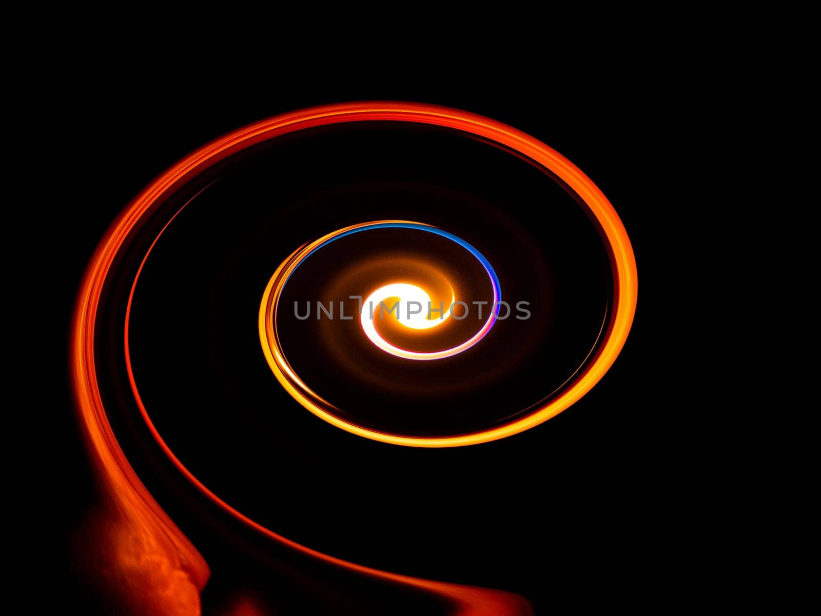 Illustration of a fiery cycle on a black background. Fiery whirlpool. Background image. Cosmic abstraction. Place for text. Cosmic space. Fantastic illustration. Website page background.