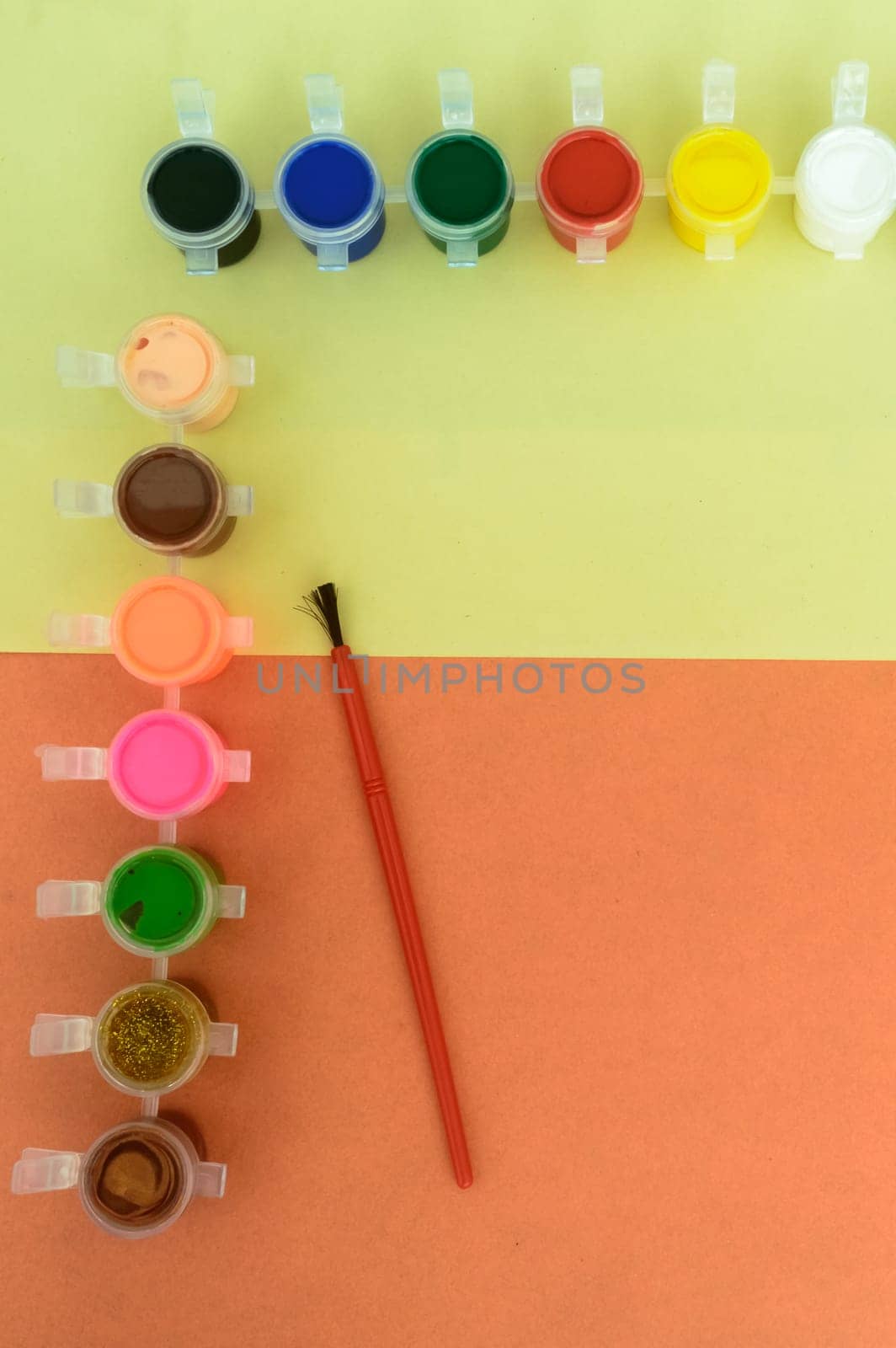 Colors art background. Watercolor paints and paintbrush. knolling concept.