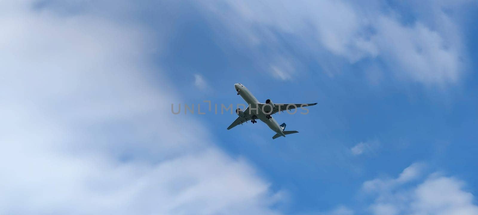 The Airplane in the sky at sunrise or sunset