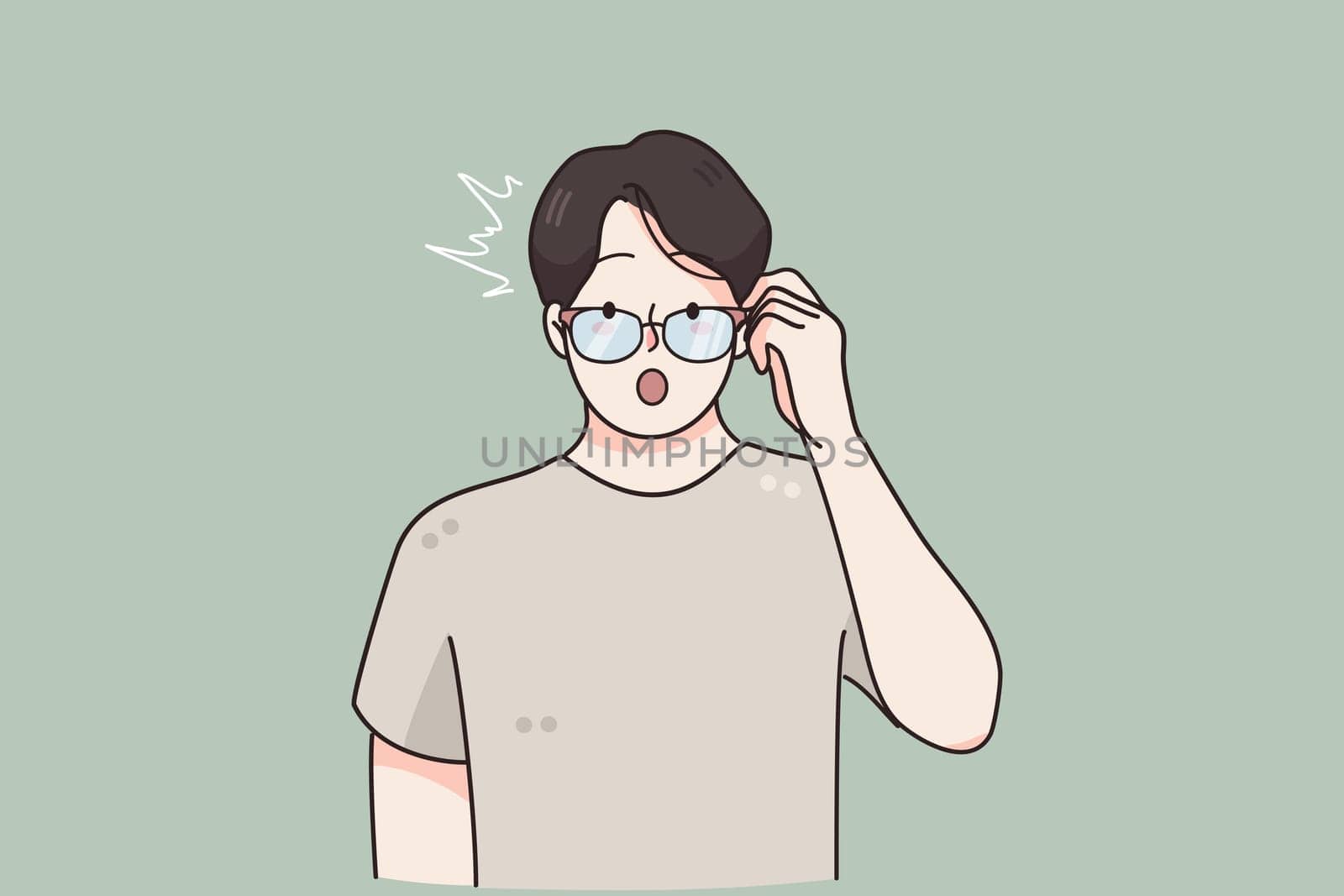 Surprise, emotions expression, frustration concept. Terrified young male cartoon character staring through glasses feeling surprised finding out about success over green background illustration