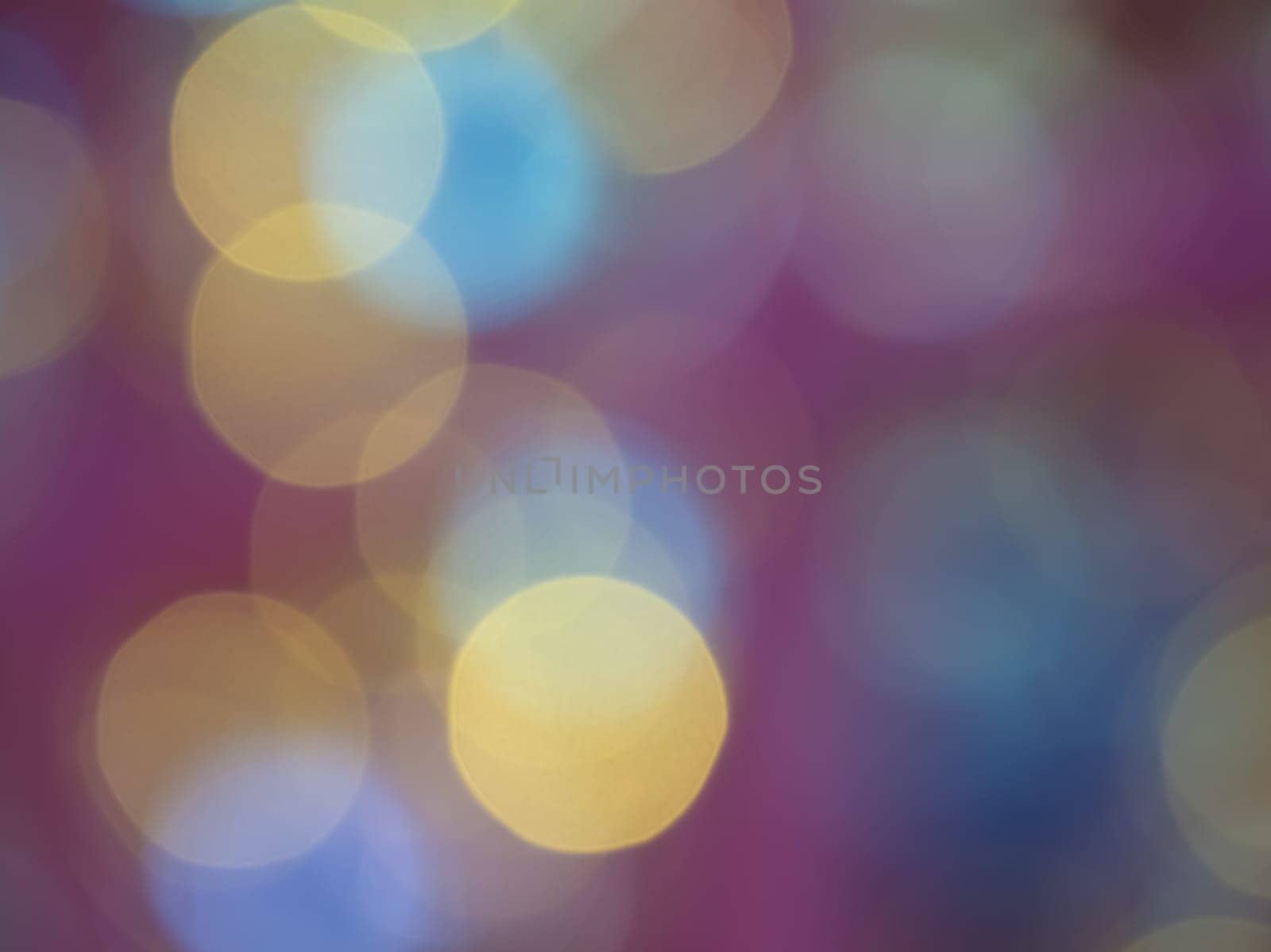 Blurry colorful Christmas bokeh lights festive background