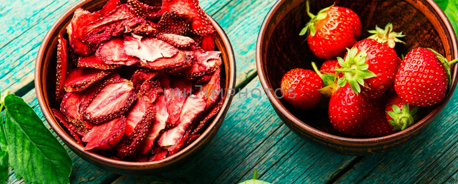 Dried summer berry,fruit dessert.Strawberry chips,berry sweetness in bowl