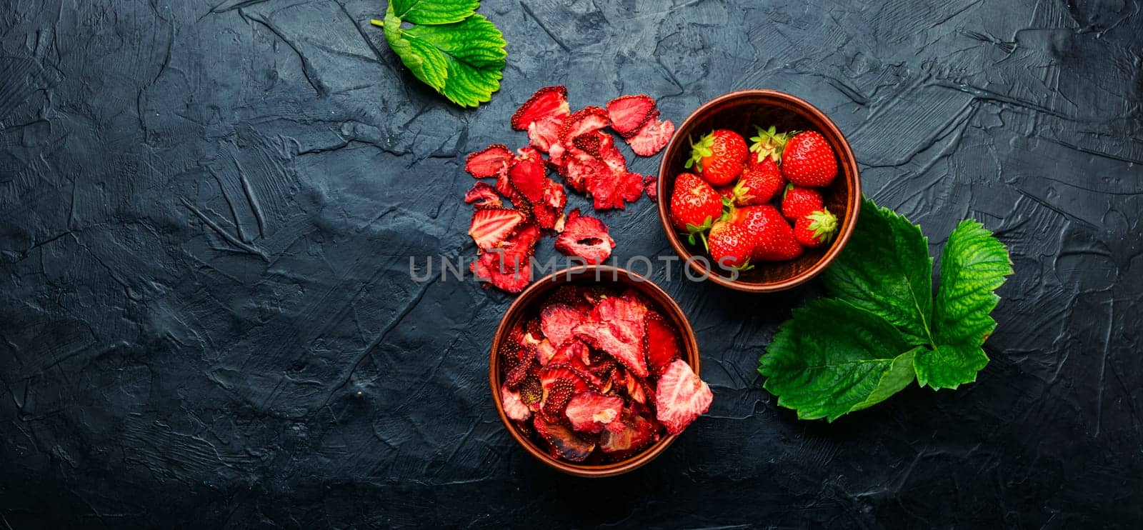 Dried summer berry,fruit dessert.Strawberry chips,berry sweetness in bowl