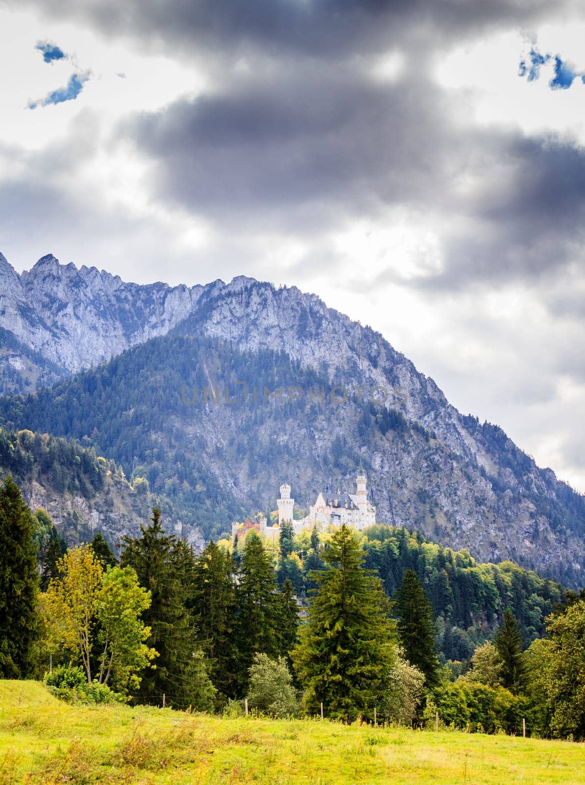 View of the Neuschwanstein Castle and the surrounding mountains in Bavaria