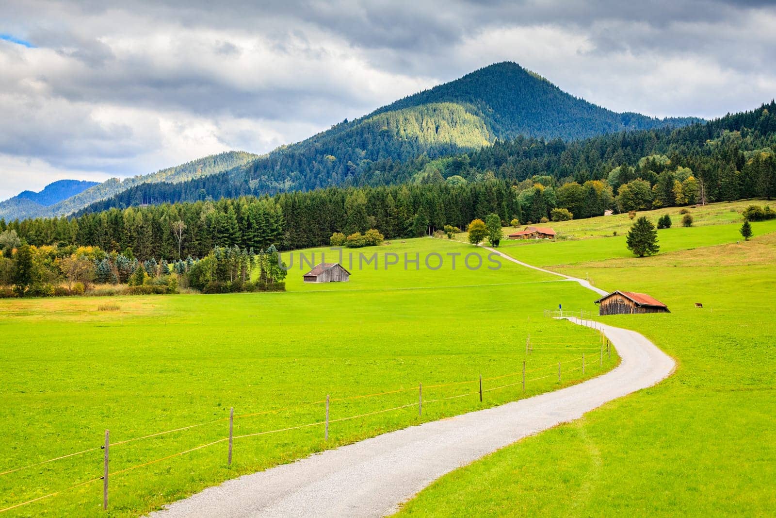 Scenic view of the countryside and narrow gravel road near Schwangau in Bavaria, Germany
