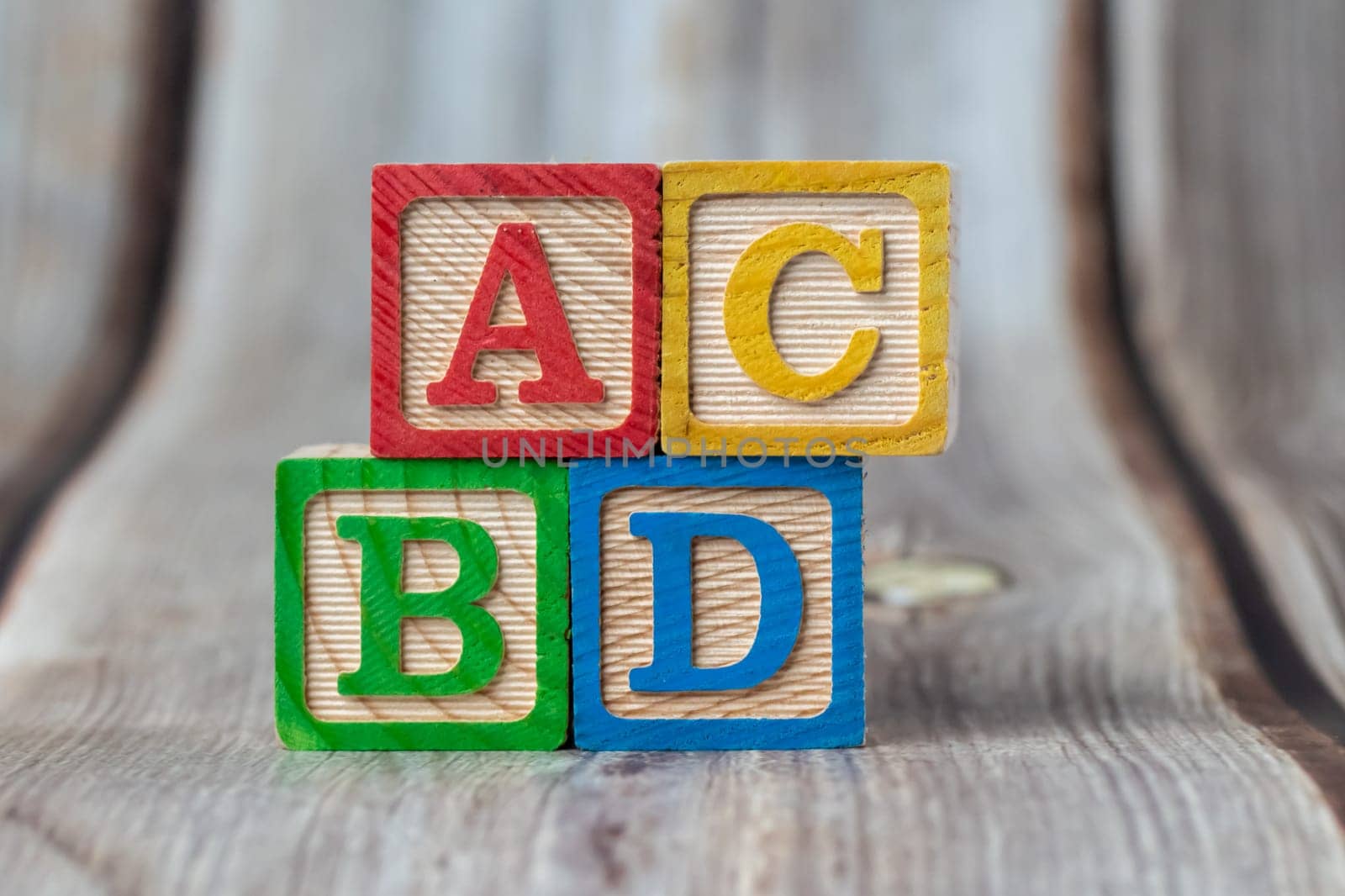 ABC wooden block on table. Kids toy