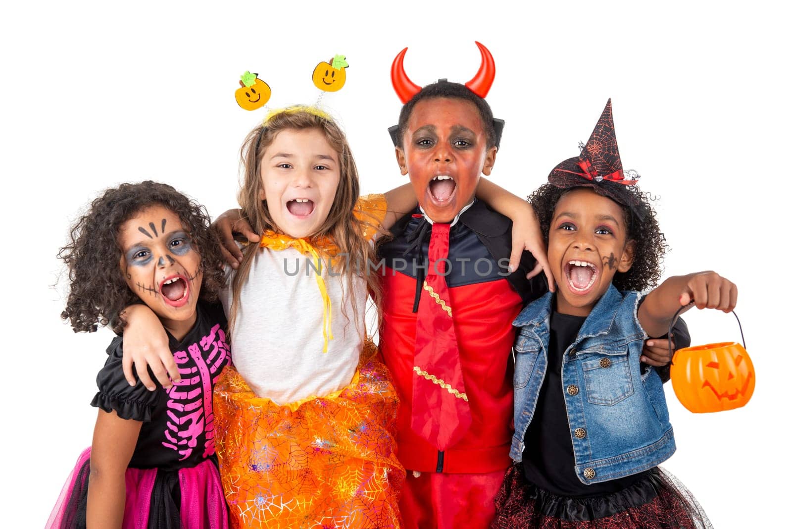 Group of kids in Halloween/Carnaval costumes isolated