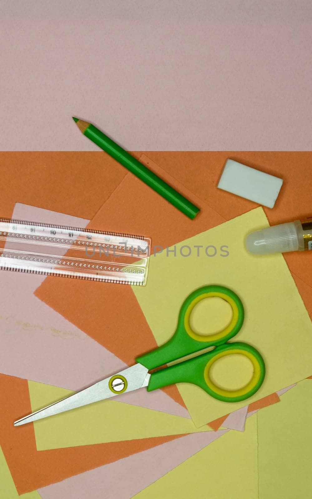 Set of school stationery supplies pencils, paint, ruler, and scissors lying on table. DIY Paper Crafts for kids. Back to school concept. Flat lay. Copy space.