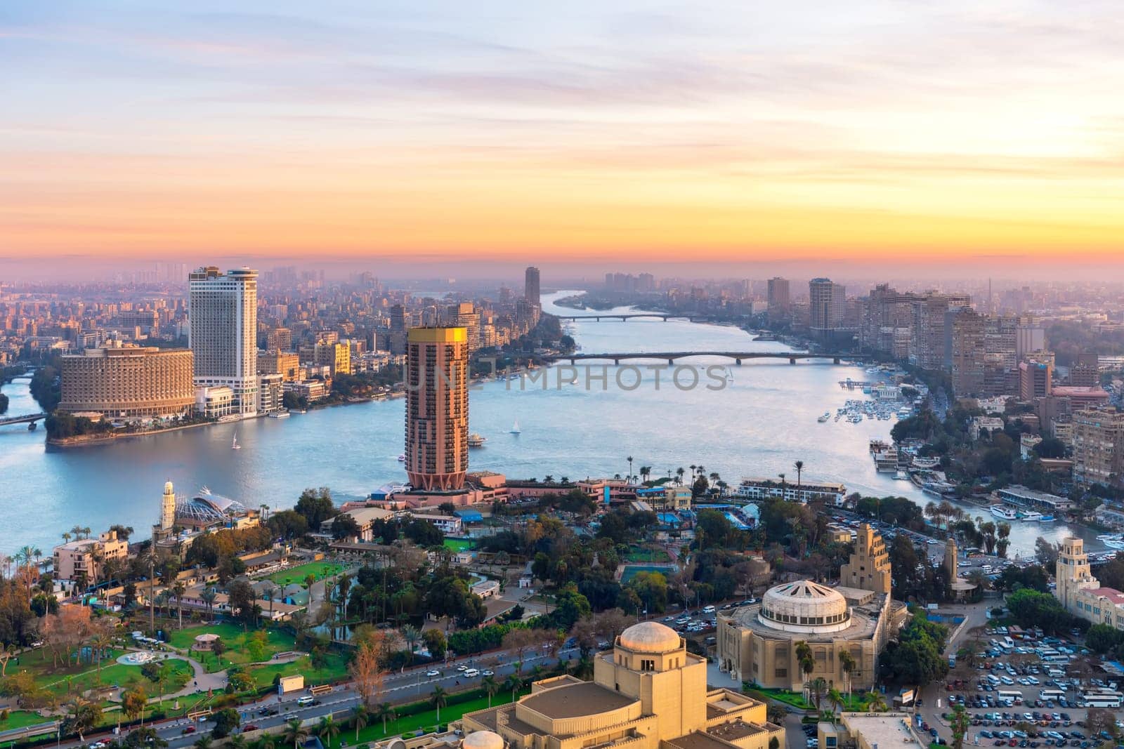 Cairo downtown with Skyscrappers on the Nile at sunset, Egypt .