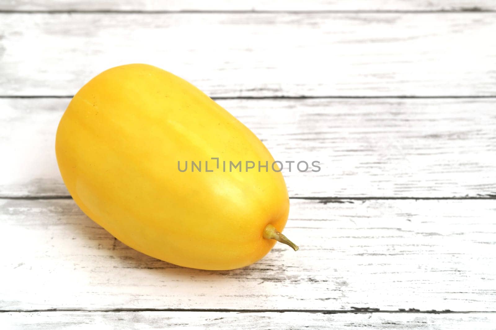 Oriental yellow melon on wooden table