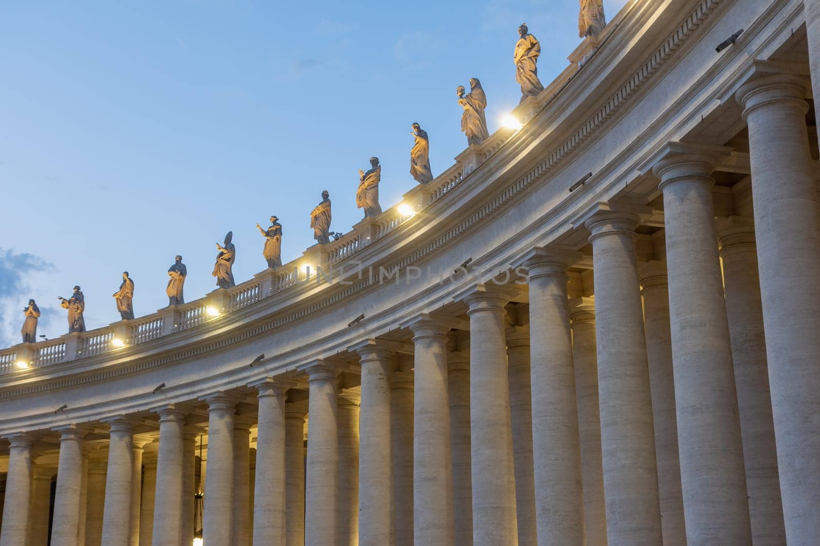 Doric columns on St. Peter’s Square in the evening. Vatican City