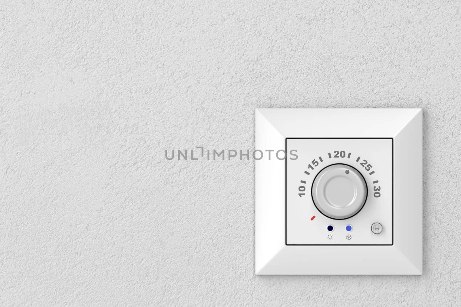Air conditioner control panel (thermostat) on a gray wall