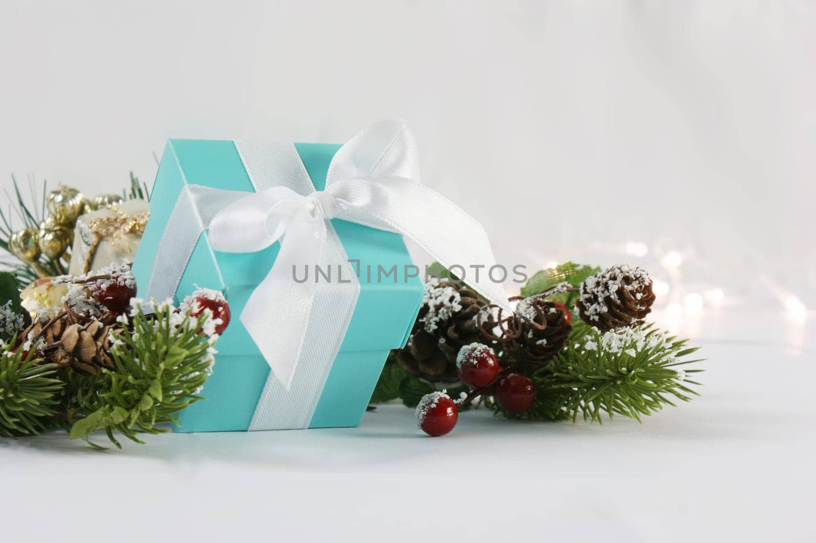 Blue Christmas gift on a white background