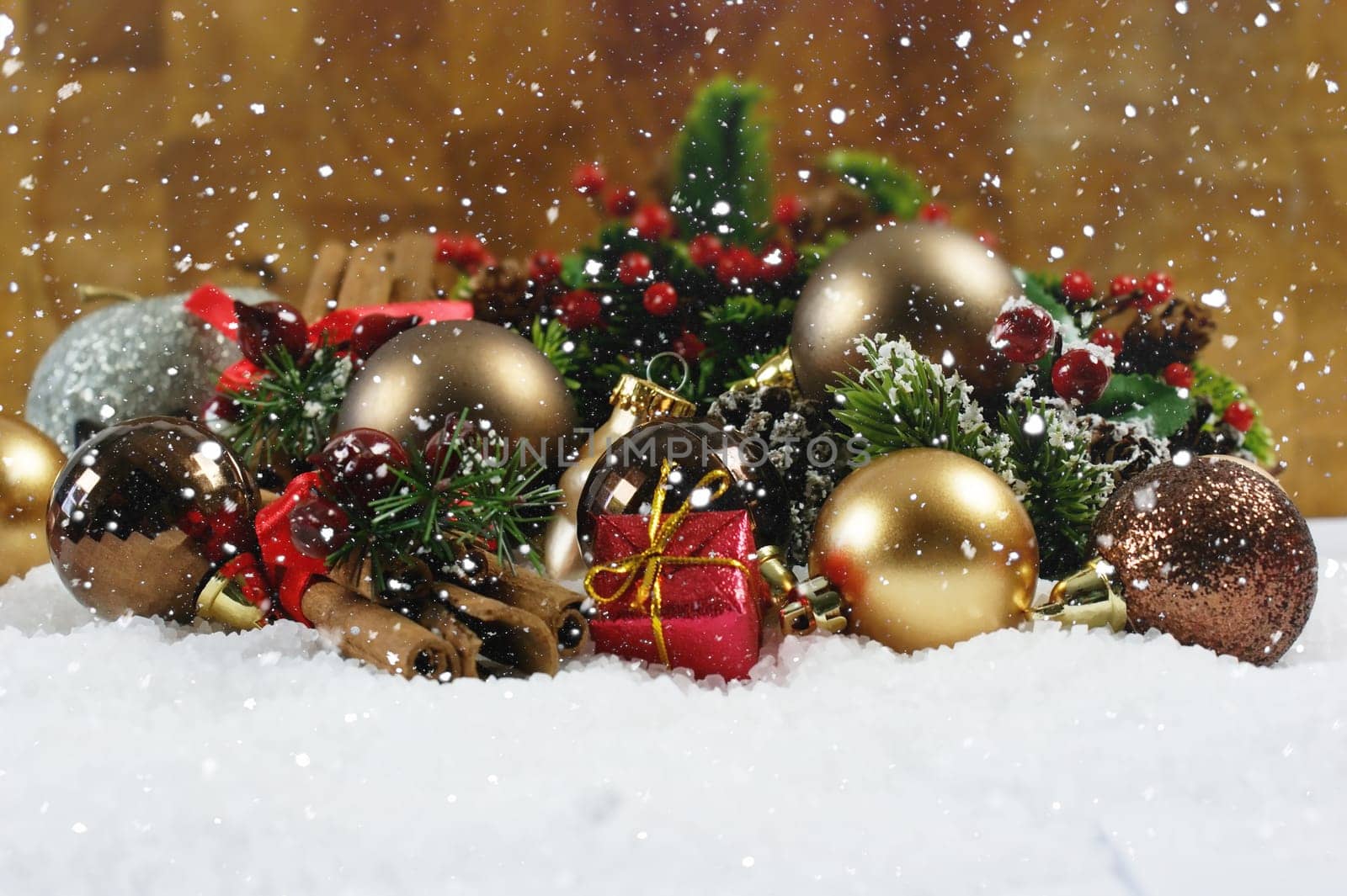 Christmas gift and decorations nestled in snow