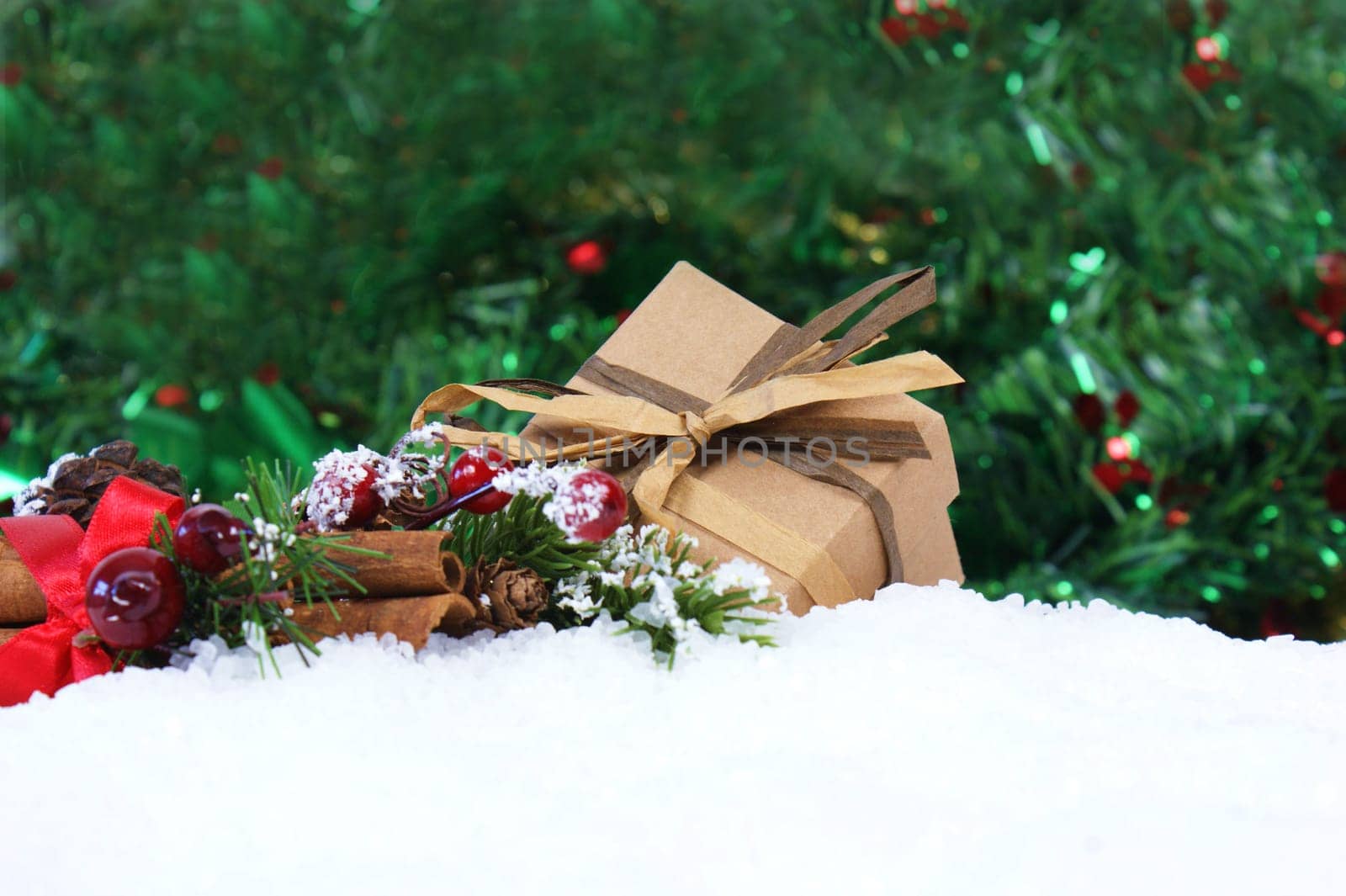 Christmas gift and decorations nestled in snow